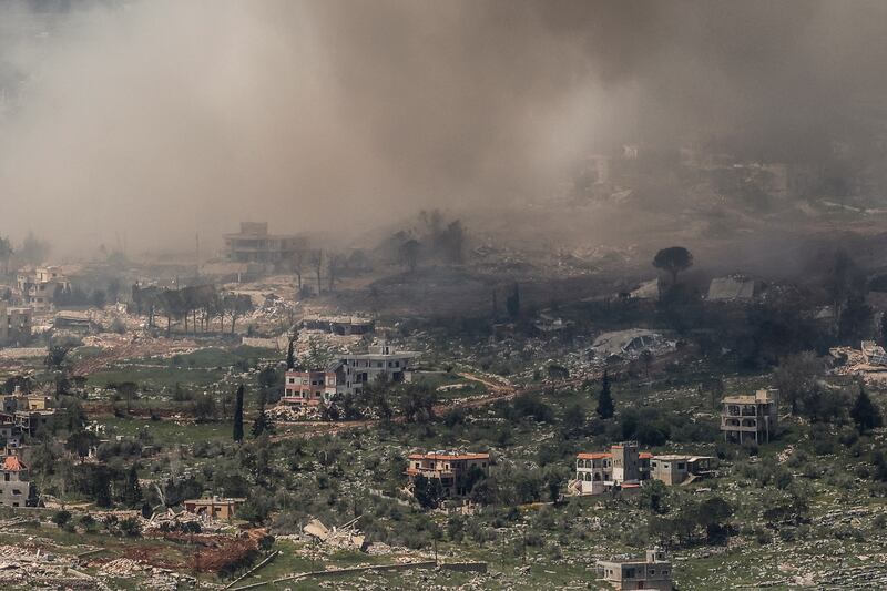 Smoke and dust engulf a town following Israeli explosions destroying buildings and homes, in southern Lebanon near the border as seen from the Upper Galilee in northern Israel on Monday. T Photograph: Jalaa Marey/ AFP via Getty Images