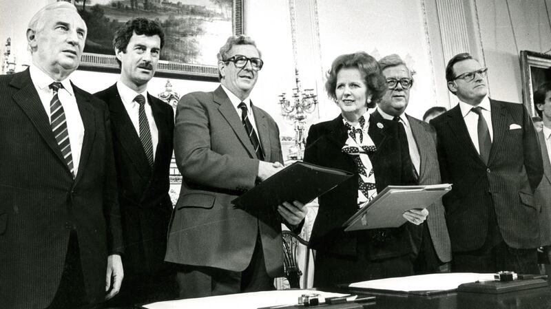 Peter Barry, Dick Spring, Garret Fitzgerald, Margaret Thatcher, Geoffrey Howe, and Tom King at the signing of the Anglo-Irish Agreement