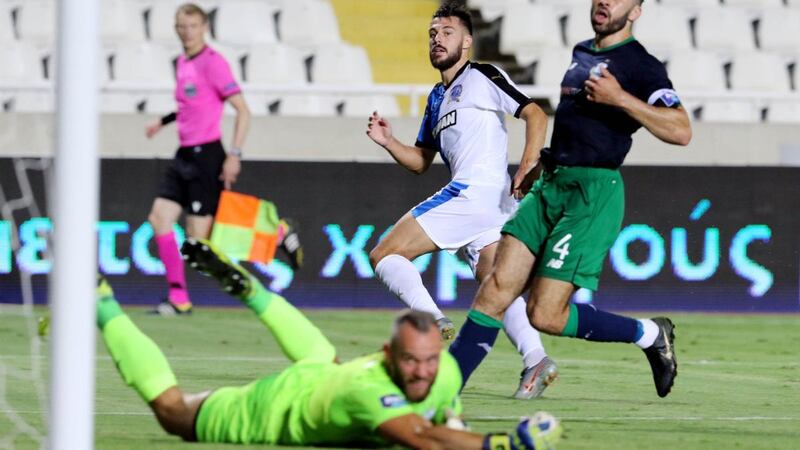 Apollon’s Adrian Sardinero scores the winning   goal past Rovers’ goalkeeper Alan Mannus. Photograph: Chara Savvides/Inpho