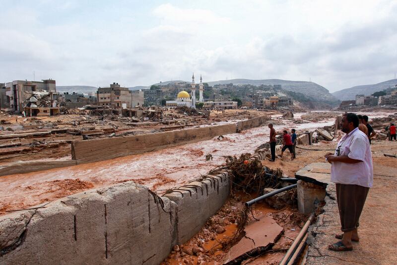 People look at the flooding in Derna. Photograph: AFP via Getty