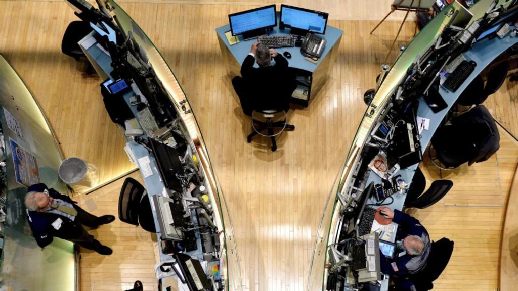 Traders work on the floor of the New York Stock Exchange. Photograph: Justin Lane/EPA