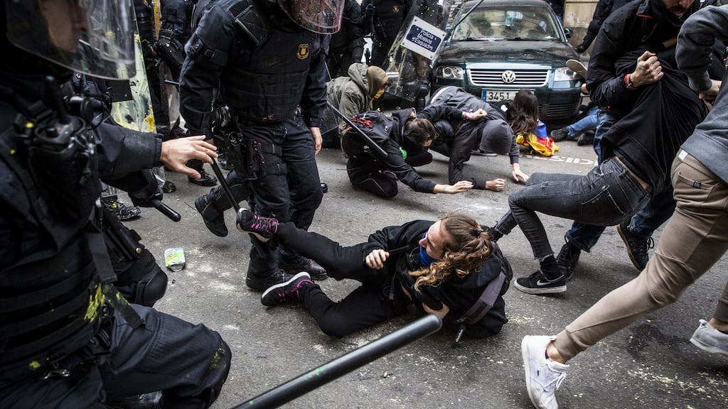 Riot police clash with supporters of Catalan independence during a protest in Barcelona on Friday. Photograph: Angel Garcia/Bloomberg