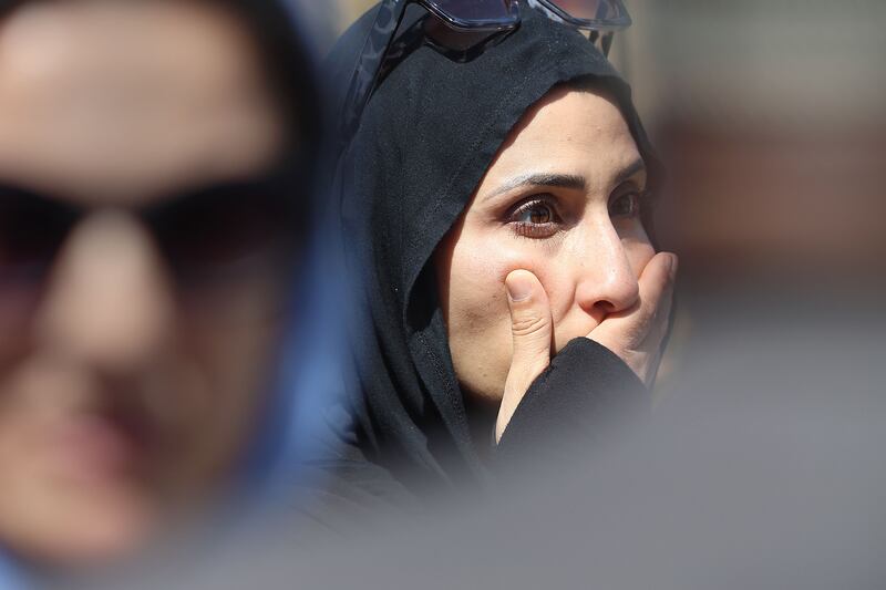 Rema Abedkader of San Diego reacts hours after the mosque shooting in San Diego, California. Photograph: EPA