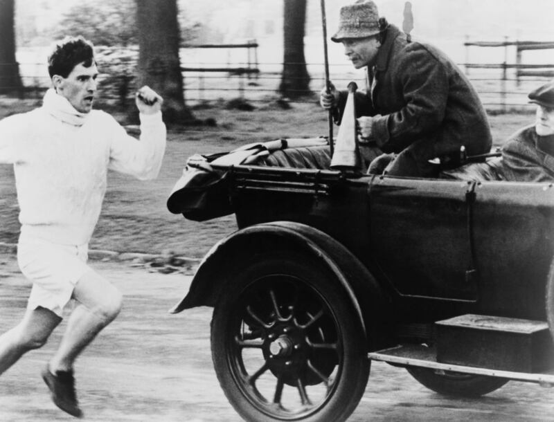 Chariots of Fire: Ian Holm, as coach Sam Mussabini, with Ben Cross in Hugh Hudson’s 1981 film. Photograph: Warner Bros/Archive Photos/Getty
