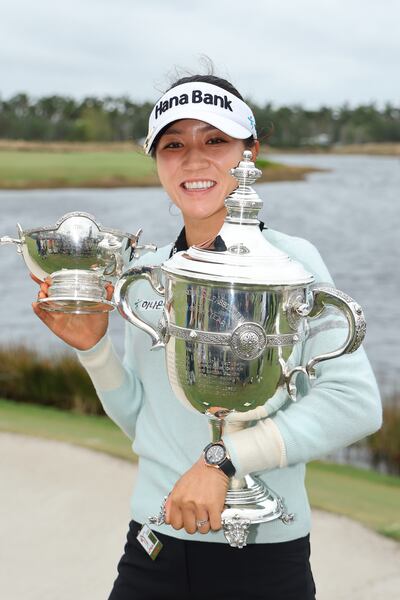 Lydia Ko of New Zealand poses with the Vare Trophy and the Rolex Player of the Year trophy after winning the CME Group Tour Championship at Tiburon Golf Club. Photograph: Michael Reaves/Getty