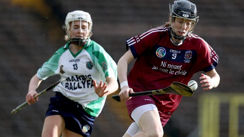 Slaughtneil’s Louise Dougan is tracked by Sarsfields’ Sinead Cannon. Photograph: Tommy Dickson/Inpho
