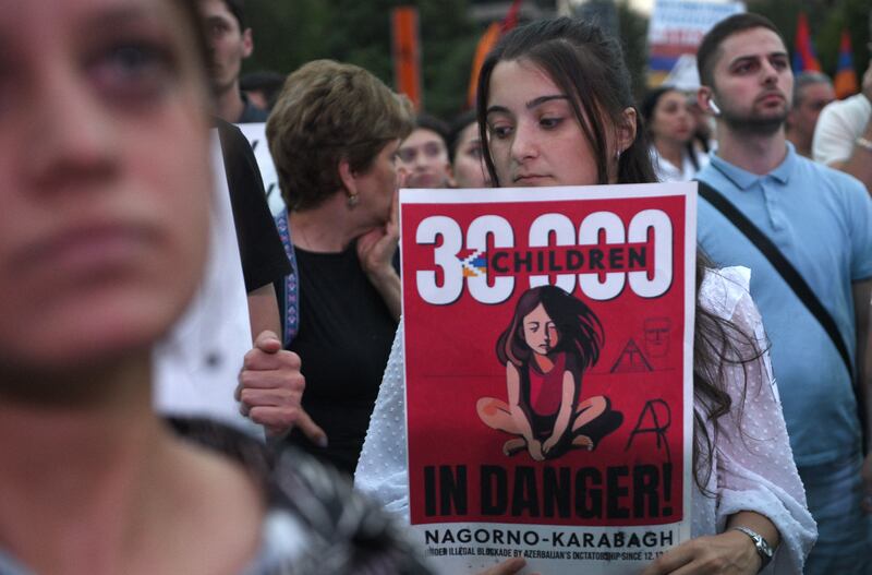 Demonstrators rally in  the Armenian capital Yerevan in July to demand the reopening of a blockaded route linking the Nagorno-Karabakh region to Armenia. Photograph: Karen Minasyan/AFP via Getty Images