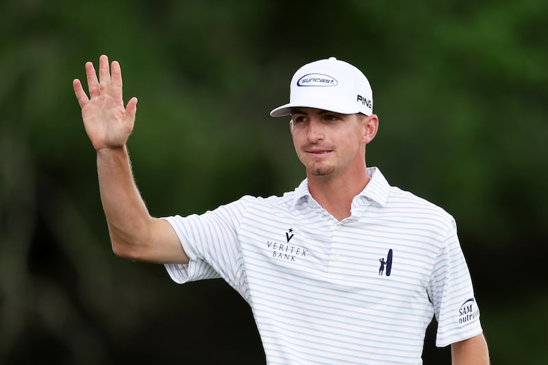 Amateur Sam Bennett reacts on the 18th green during the second round of the Masters at Augusta National Golf Club. Photograph: Christian Petersen/Getty Images