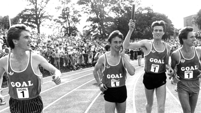 Frank O’Mara, Marcus O’Sullivan, Ray Flynn and Eamonn Coghlan doing a lap of honour after setting the world record for the 4x1 mile relay at Belfield in August 1985.  Photograph: Dermot O’Shea