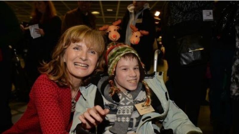 Adi Roche with a teenager from the Chernobyl region of Belarus who visited Ireland through her Chernobyl Children International charity. Photograph: Alan Betson