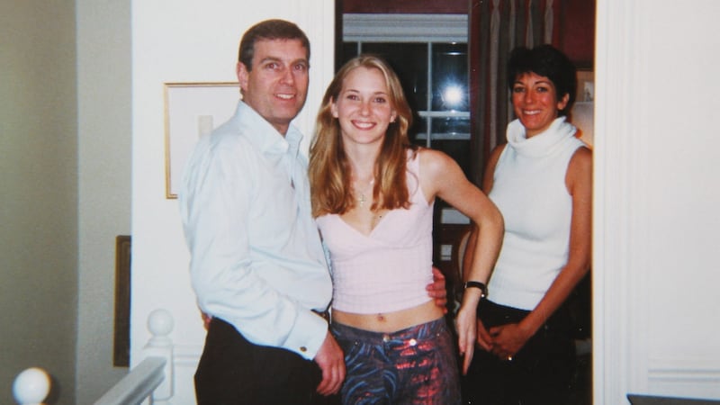 Prince Andrew, Virginia Giuffre and Ghislaine Maxwell at Maxwell’s home in London in 2001. Prince Andrew’s supporters claim the photo is fake. Photograph: Virginia Giuffre