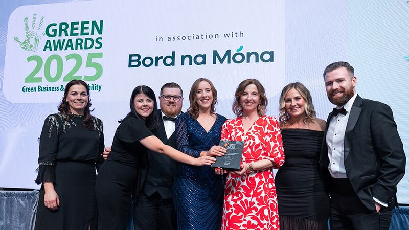 Maria Kelly, director, skillnet climate ready academy, presents sustainability team of the year (1000+ Employees) to, Compass Ireland team.