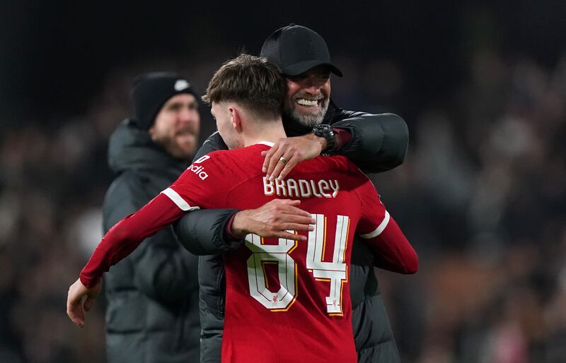 Liverpool manager Jurgen Klopp embraces Northern Ireland's Conor Bradley. Photograph: Bradley Collyer/PA Wire