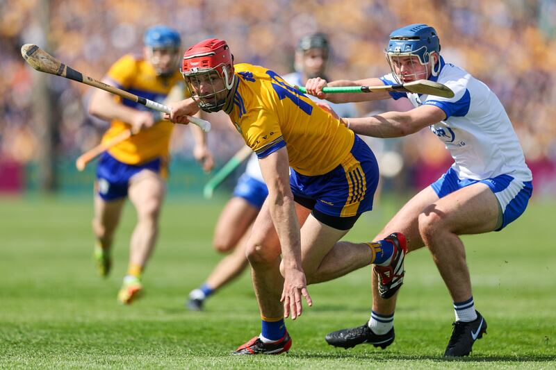 Peter Duggan of Clare in action against Aaron O'Neill of Waterford in Cusack Park on April 19th. Photograph: Natasha Barton/Inpho