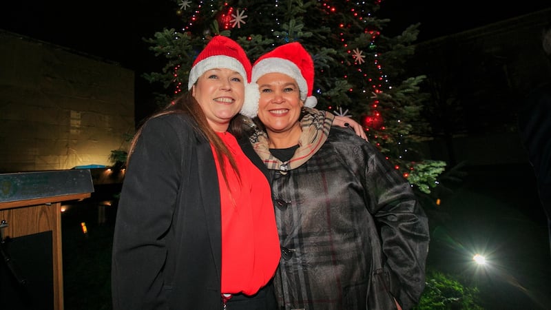 Sinn Féin TD Louise O Reilly (left) and party president Mary Lou McDonald TD during a turning on  for the Oireachtas Christmas tree lights at Leinster House, Dublin Photograph: Gareth Chaney/Collins