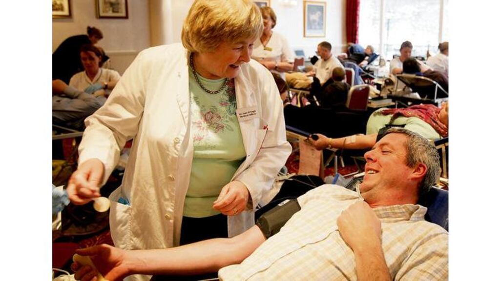 Dr Jane Keogh taking blood from donor Roddy McMyler at a clinic set up in the River Court Hotel in Kilkenny yesterday.