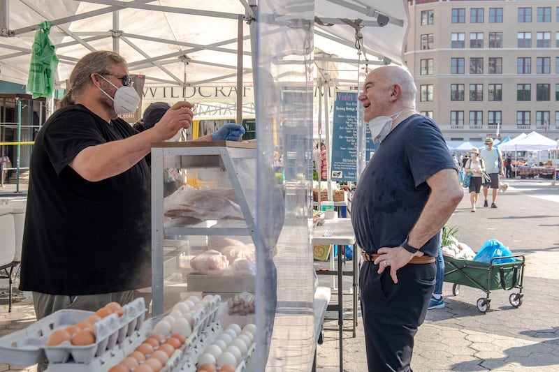 Bill Buford with Paul Dench-Layton of Violet Hill Farm, who supplied Buford with chickens in New York. Photograph: Brittainy Newman/New York Times