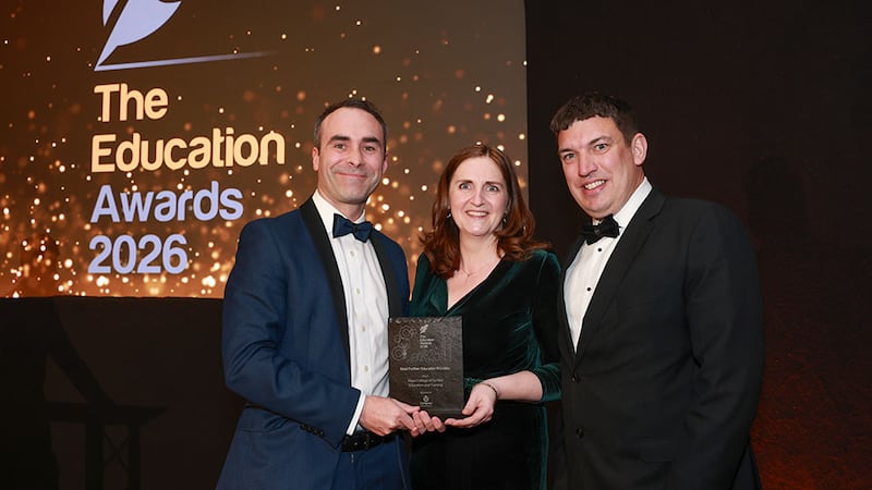 Owen McGowan, country manager, Compass Education, presents the best further education provider award to Michael Murphy and Eithne O'Malley, Mayo College of Further Education and Training
