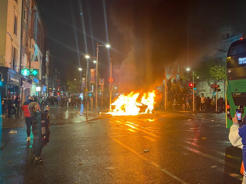 A car on fire on O'Connell Street. Photograph: Ellen O'Riordan