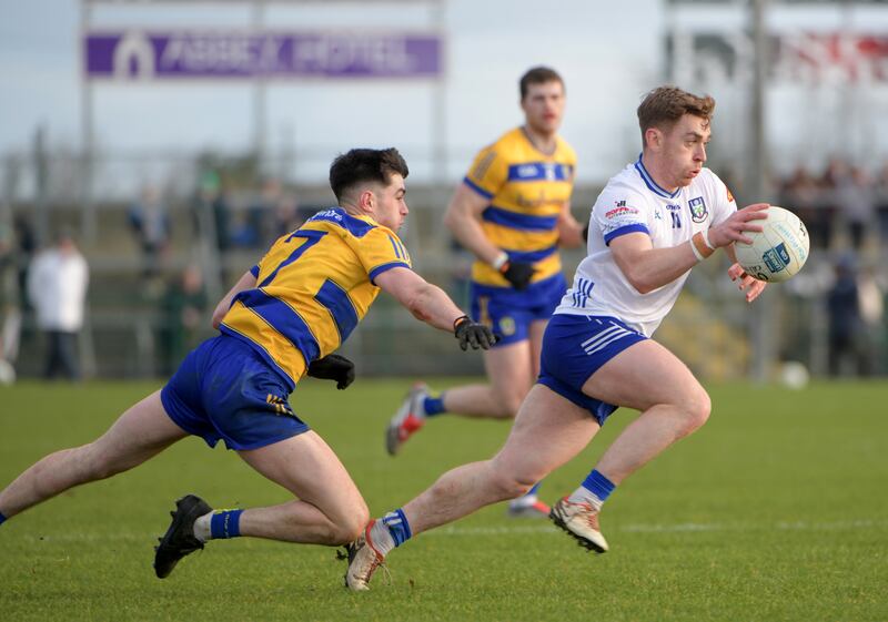 Mongahan's Micheál Brannigan is challenged by Roscommon's Senan Lambe. Photograph: Andrew Paton/Inpho
