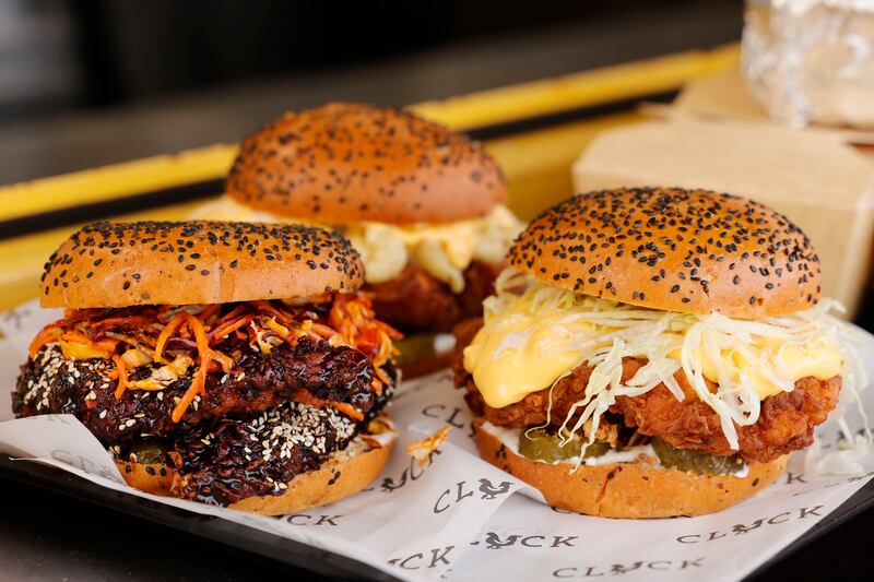The Korean Fried Chicken, Mother Clucker and Incredible Cluck Burgers and Buffalo Fries. Photograph: Alan Betson
