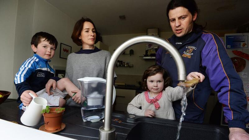 Cash flow: Hilary Lemass and Shane Harte with their children, Oscar  and Iseult.  Photograph: Cyril Byrne