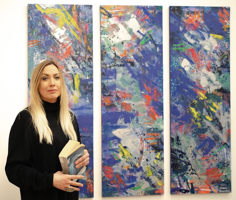 Natalie with her abstract art creation Burst!