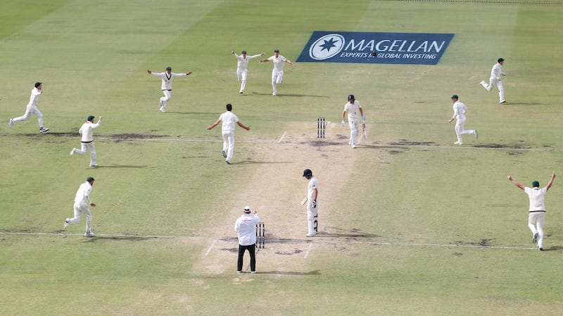 Australia celebrate the final wicket of Chris Woakes to win the Ashes. Photo: Jason O’Brien/PA Wire