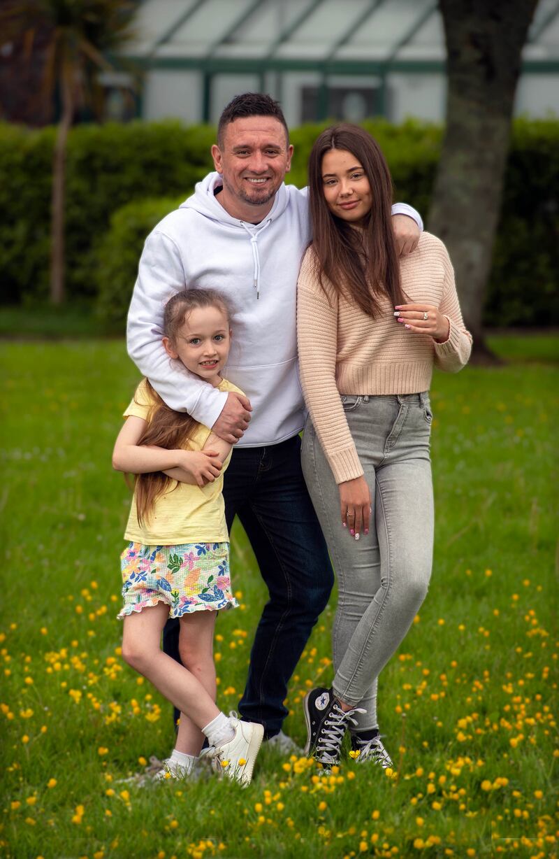Paul Byrne with Katie (16) and Ava (7). On home working, he says: 'My mother was sick last year and she was here with us and I was able to look after her. You are able to do the things that you traditionally would not be able to do.' Photograph: Michael Mac Sweeney/Provision 