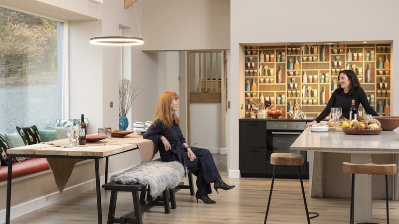 A long window brings in natural light to the kitchen counter. Photograph: Brian McLochlainn