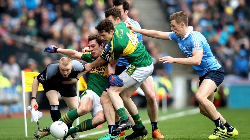 Dublin’s Michael Darragh McAuley and Paul Mannion battle Kerry’s Ronan Shanahan and David Moran during Kerry’s AFL final win. Ryan Byrne/Inpho