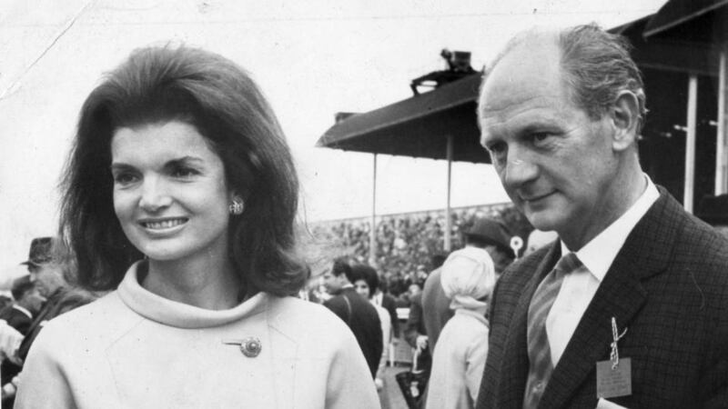 Mrs Jacqueline Kennedy with the taoiseach Mr Lynch, at the Irish Derby in the Curragh in 1967.  Saturday. Photograph: Dermot Barry / The Irish TImes