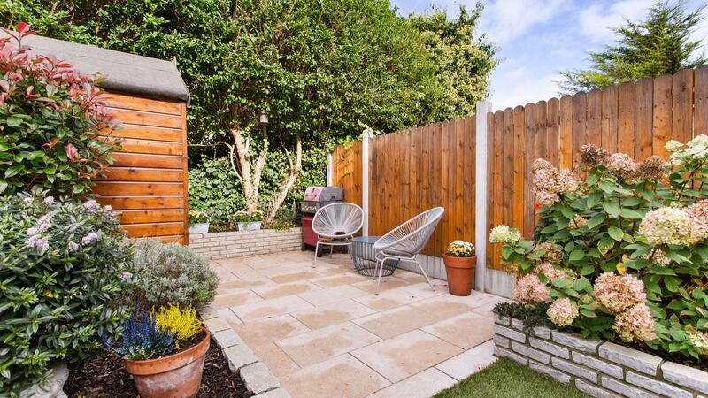 Patio with shed used as laundry room