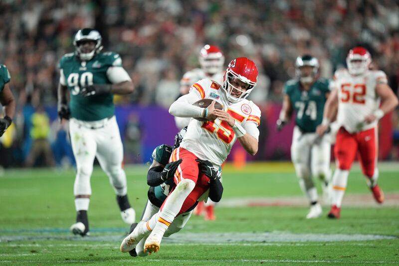 Kansas City Chiefs quarterback Patrick Mahomes scrambles for a long first down during the fourth quarter of Super Bowl LVII against Philadelphia Eagles at State Farm Stadium in Glendale, Arizona. Photograph: Doug Mills/New York Times