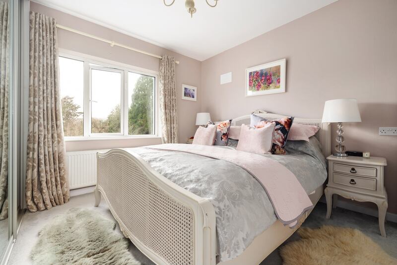 Principal bedroom: calm lilac on the first floor. Photograph: Andrew Nolan Photography