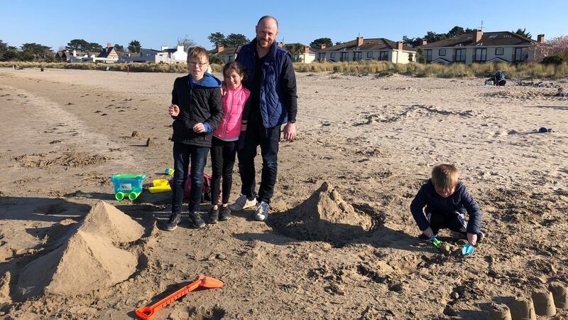 Stephen O’Dwyer and his children:  “I haven’t had to ask anybody to step back, and the kids get it, so there have been no problems.”  Photograph: Jade Wilson
