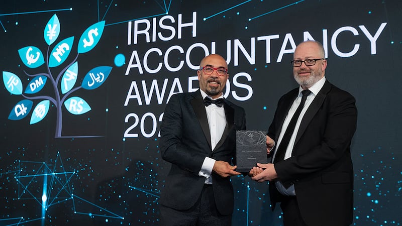 Flavio Greco, sales and marketing director at Iplicit Ireland, presents the best finance collaboration award to Liam Foley, Allianz Ireland