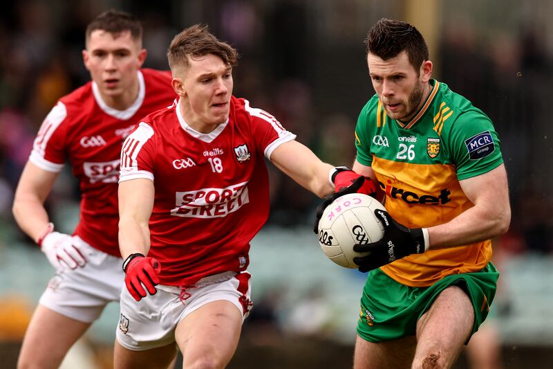 Cork's Darragh Cashman with Eoghan Bán Gallagher of Donegal during the Division Two clash at MacCumhail Park, Ballybofey. Photograph: Ben Brady/Inpho 