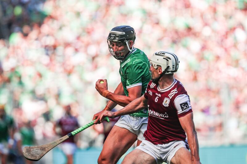 Limerick's Gearóid Hegarty and Daithí Burke of Galway in action on Sunday. Photograph: Bryan Keane/INPHO