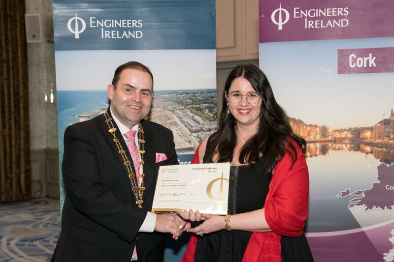 EI president Edmond Harty awards the title of Chartered Engineer to Cork-based Paula Bisordi Huwel