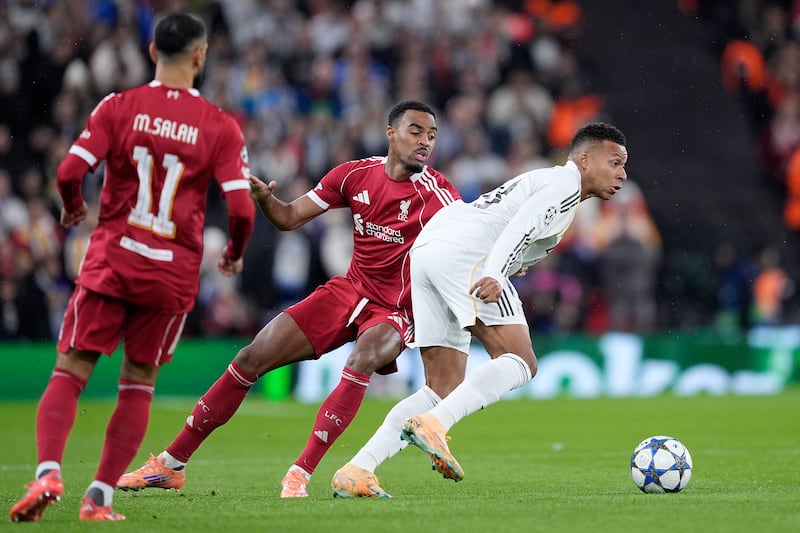 Real Madrid's Kylian Mbappe in challenges by Liverpool's Ryan Gravenberch. Photograph: Peter Byrne/PA