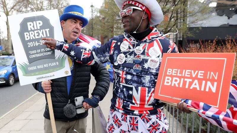 Anti-Brexit campaigner Steve Bray  talks with pro-Brexit supporter Joseph Afrane  near the Houses of Parliament in London on Wednesday. Photograph:  Isabel Infantes/AFP/Getty Images)