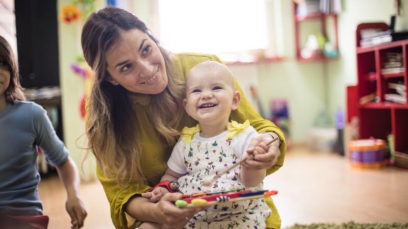 Our Lady’s and St Mochua’s uses the Roots of Empathy programme, where pupils learn from a newborn baby’s reactions in the classroom. Photograph: iStocl