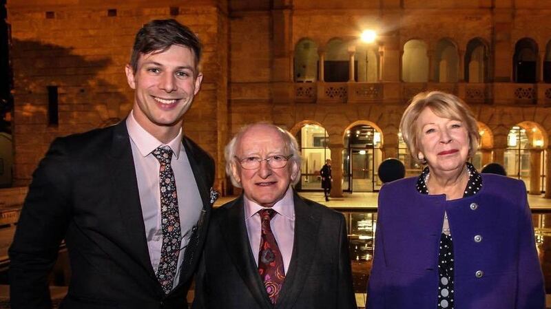 Oisín Tracey meeting President Michael D Higgins and Sabrina Higgins.