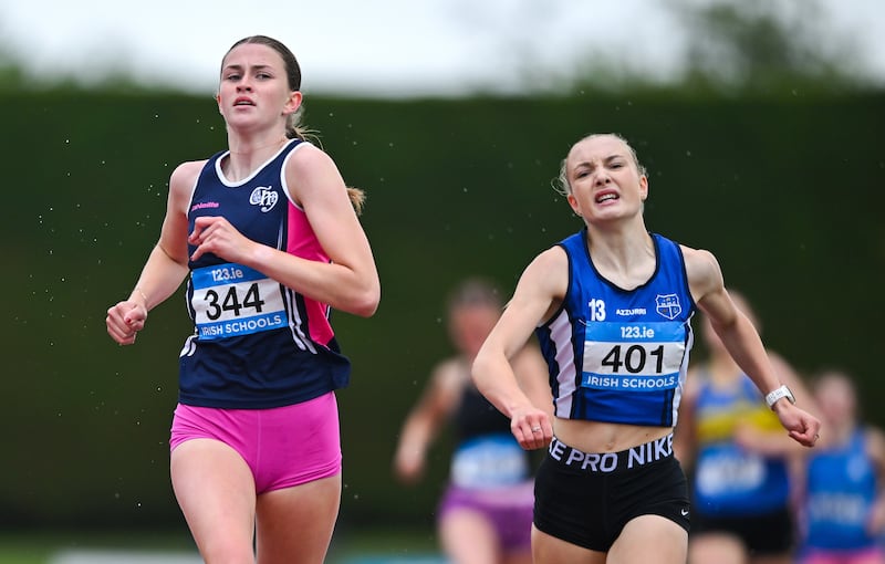 Faye Mannion (Coláiste Muire, Clare) and Freya Bateman (Mount Mercy, Cork) who took first and second respectively in the intermediate girls 800m event. Photograph: Shauna Clinton/Sportsfile