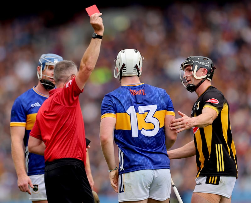 Referee James Owens red-cards Darragh McCarthy of Tipperary. Photograph: James Crombie/Inpho