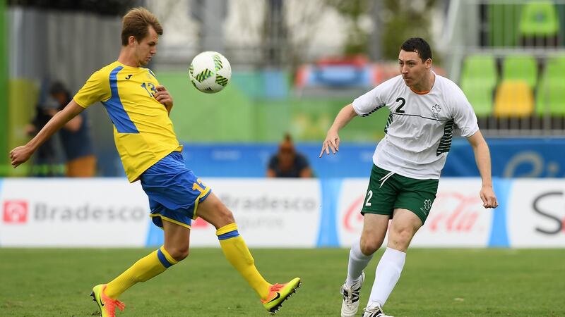 Joseph Markey of Ireland in action against Artem Krasylnykov of Ukraine  in the men’s 7-a-side football preliminaries at Deodoro Stadium in Rio de Janeiro. Photograph: Diarmuid Greene/Sportsfile