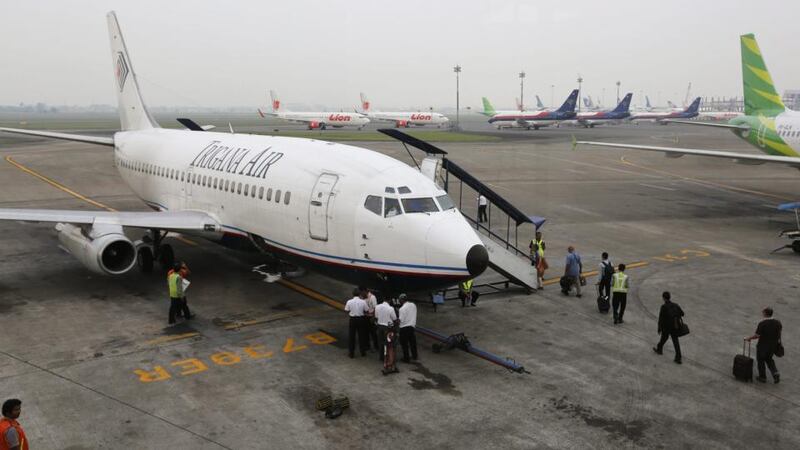 File photograph of a  Trigana Air plane at Jakarta Soekarno-Hatta International Airport in Jakarta, Indonesia. A plane belonging to the airline has gone missing over Papua ; 54 people are believed to be on board. Photograph: Barbara Walton/EPA