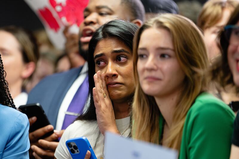 Attendees listen as Kamala Harris speaks at the Democratic Party's presidential election headquarters in Wilmington, Delaware on Monday. Photograph: Erin Schaff/New York Times
                      