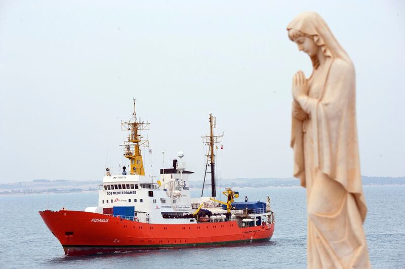 Rescue vessel Aquarius ship approaches Pozzallo harbor in southern Italy.  Photograph: Salvatore Cavalli/AP